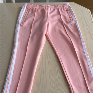Adidas Women's Light Peach Joggers with White Stripes